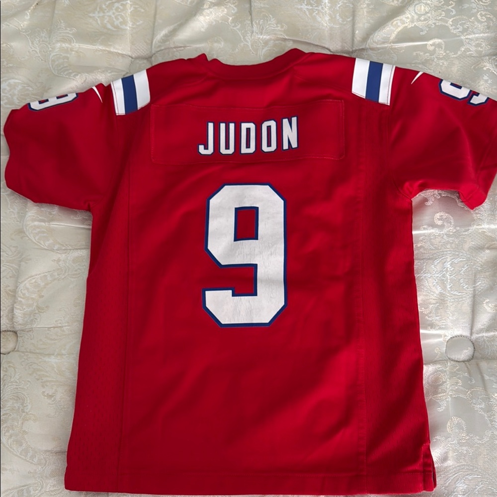 Nike Patriots Matthew Judson Kids MD Red Jersey.